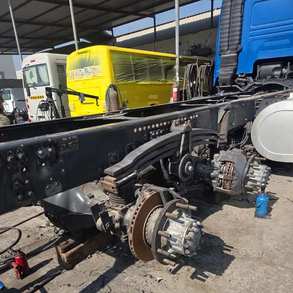 Truck axle and brake drum during repair work