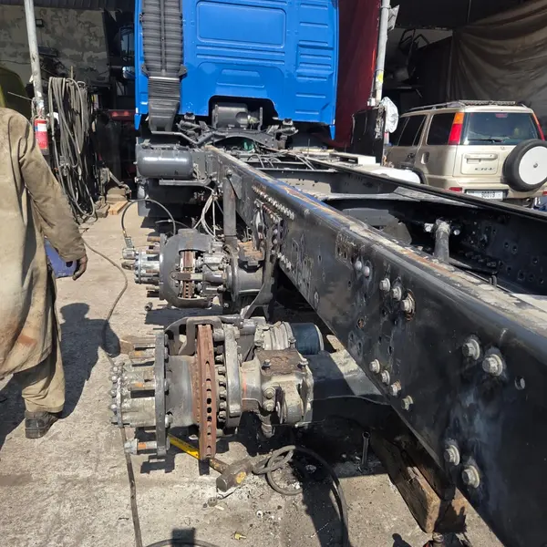 Heavy truck chassis stripped down for frame work